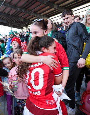 130424 - Ireland  v Wales, Guinness Women’s 6 Nations - Gwennan Hopkins of Wales with her first cap and her family after the match