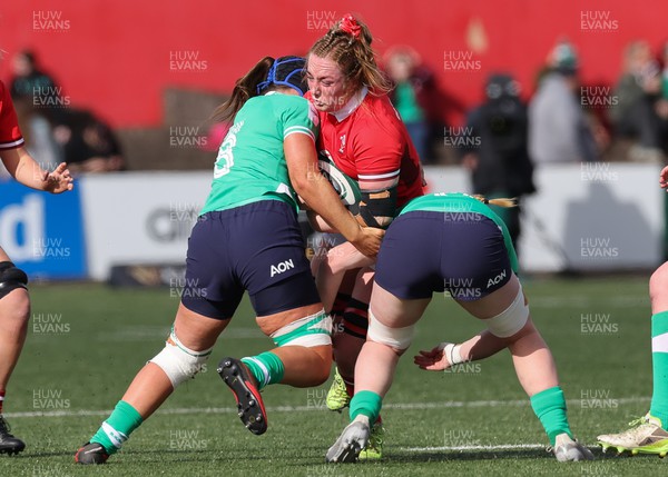 130424 - Ireland  v Wales, Guinness Women’s 6 Nations - Abbie Fleming of Wales takes on Brittany Hogan of Ireland and Aoife Wafer of Ireland’