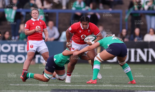 130424 - Ireland  v Wales, Guinness Women’s 6 Nations - Sisilia Tuipulotu of Wales takes on Brittany Hogan of Ireland and Dorothy Wall of Ireland