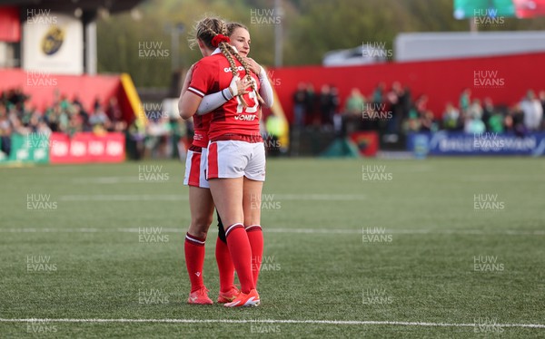 130424 - Ireland  v Wales, Guinness Women’s 6 Nations - Hannah Jones of Wales and Jasmine Joyce of Wales embrace at the end of the match