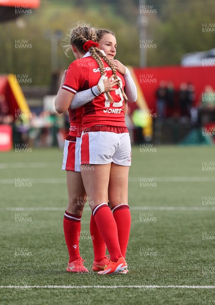 130424 - Ireland  v Wales, Guinness Women’s 6 Nations - Hannah Jones of Wales and Jasmine Joyce of Wales embrace at the end of the match