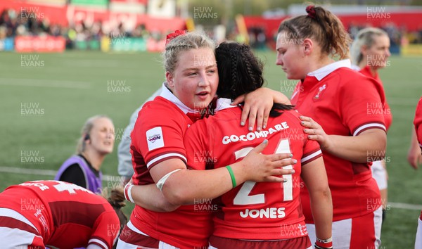 130424 - Ireland  v Wales, Guinness Women’s 6 Nations - Molly Reardon of Wales and Sian Jones of Wales embrace at the end of the match