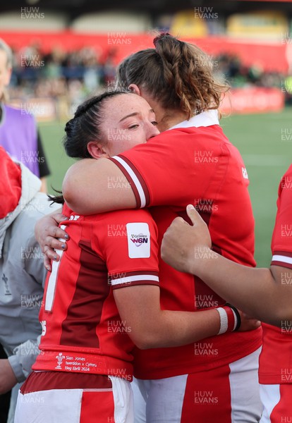 130424 - Ireland  v Wales, Guinness Women’s 6 Nations - Sian Jones of Wales and Gwenllian Pyrs of Wales embrace at the end of the match