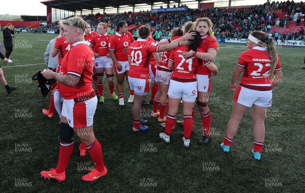 130424 - Ireland  v Wales, Guinness Women’s 6 Nations - Wales players embrace each other att the end of the match