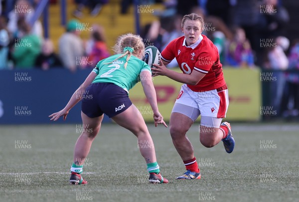 130424 - Ireland  v Wales, Guinness Women’s 6 Nations - Lleucu George of Wales takes on Neve Jones of Ireland