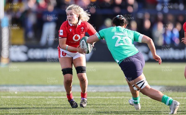 130424 - Ireland  v Wales, Guinness Women’s 6 Nations - Alex Callender of Wales takes on Shannon Ikahihifo of Ireland 