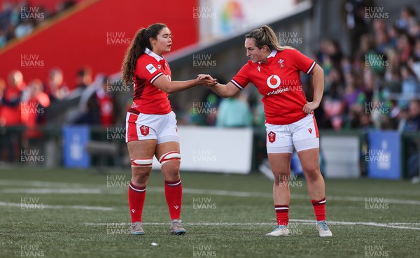 130424 - Ireland  v Wales, Guinness Women’s 6 Nations - Gwennan Hopkins of Wales, left, is congratulated by Courtney Keight of Wales after she scores try