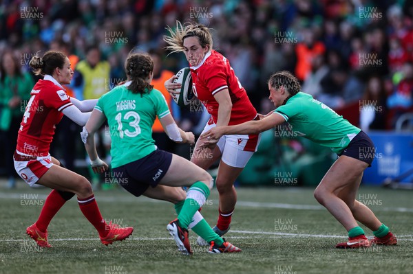 130424 - Ireland  v Wales, Guinness Women’s 6 Nations - Courtney Keight of Wales is held by the Irish defence