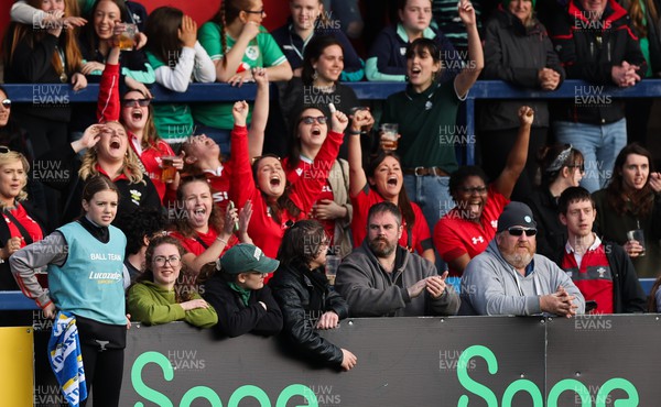 130424 - Ireland  v Wales, Guinness Women’s 6 Nations - Wales fans cheer on the team during the match