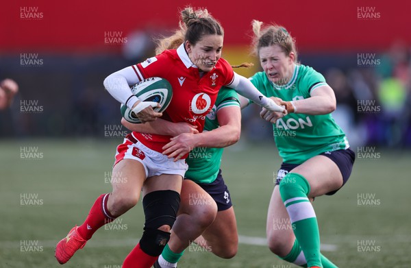 130424 - Ireland  v Wales, Guinness Women’s 6 Nations - Jasmine Joyce of Wales is held short of the line