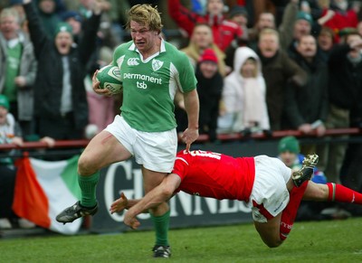 26.02.06..Ireland v Wales, Six Nations Irelands Jerry Flannery is tackled by Lee Byrne 
