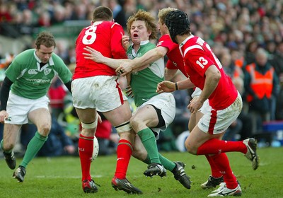 26.02.06..Ireland v Wales, Six Nations Irelands Brian O'Driscoll is checked by Michael Owen 