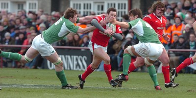 26.02.06  Ireland v Wales, Dublin  Wales Mark Jones is tackled by Malcolm O'Kelly and Donnacha O'Callaghan.  