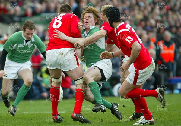 26.02.06..Ireland v Wales, Six Nations Irelands Brian O'Driscoll is checked by Michael Owen 