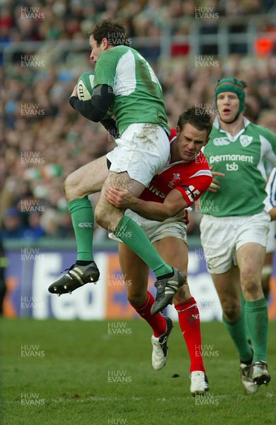 26.02.06..Ireland v Wales, Six Nations Irelands Geordan Murphy is tackled by  Lee Byrne 