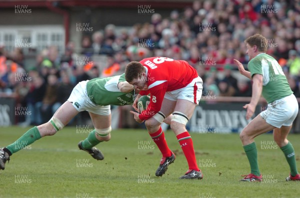 26.02.06  Ireland v Wales, Dublin  Wales Michael Owen is tackled by Malcom O'Kelly.   