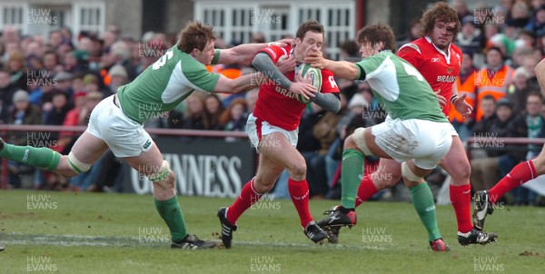 26.02.06  Ireland v Wales, Dublin  Wales Mark Jones is tackled by Malcolm O'Kelly and Donnacha O'Callaghan.  