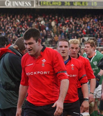 22.02.04  Ireland v Wales  L-r Michael Owen Gethin Jenkins and Alix Popham leave the field at the end of the game.  Huw Evans,Cardiff