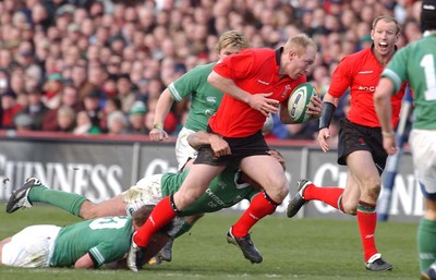 22.02.04  Ireland v Wales  Wales Tom Shanklin is tackled by Keith Gleeson and Ronan O'Gara.  Huw Evans,Cardiff