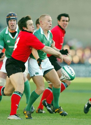 22-02-04. Ireland v Wales.  Wales' Rhys Williams gets hold of Peter Stringer as he spills ball  