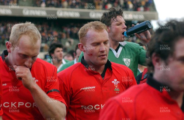 22.02.04  Ireland v Wales  Wales captain Martyn Williams leaves the field with Tom Shanklin at the end of the game.  Huw Evans,Cardiff