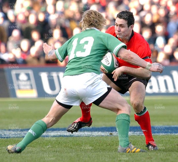 22.02.04  Ireland v Wales  Wales Stephen Jones takes on Brian O'Driscoll  Huw Evans,Cardiff