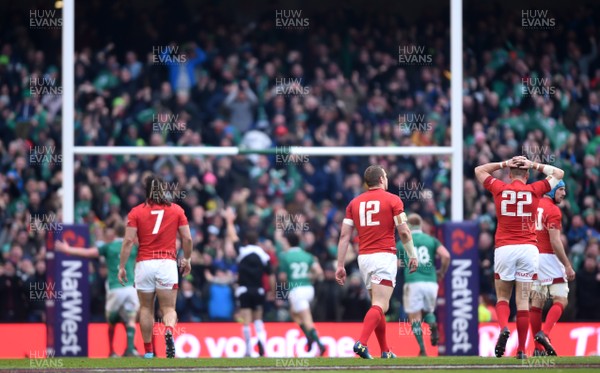 240218 - Ireland v Wales - NatWest 6 Nations 2018 - Gareth Anscombe of Wales looks dejected as the final try of the game is scored