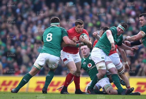 240218 - Ireland v Wales - NatWest 6 Nations 2018 - Elliot Dee of Wales is tackled by CJ Stander of Ireland