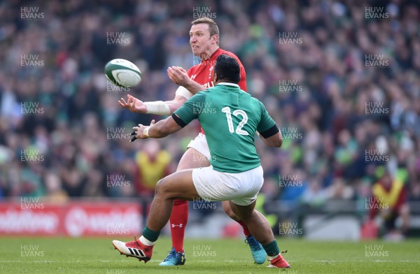 240218 - Ireland v Wales - NatWest 6 Nations 2018 - Hadleigh Parkes of Wales gets the ball away