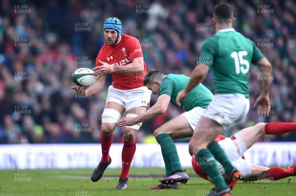 240218 - Ireland v Wales - NatWest 6 Nations 2018 - Justin Tipuric of Wales is tackled by Jacob Stockdale of Ireland