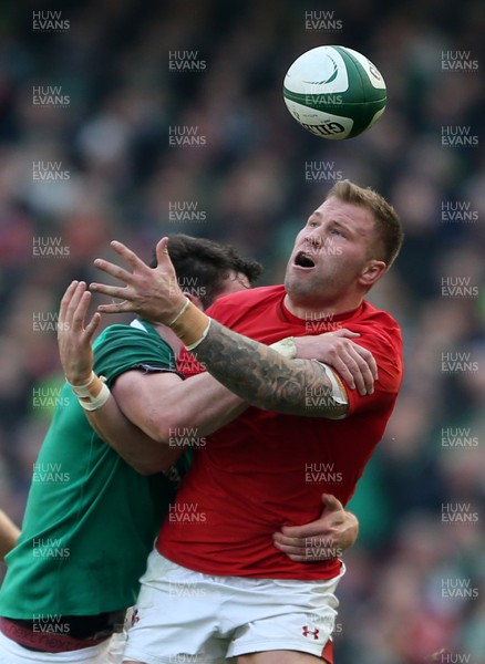 240218 - Ireland v Wales - Natwest 6 Nations - Ross Moriarty of Wales looks on frustrated as he knocks the ball on whilst being tackled by James Ryan of Ireland