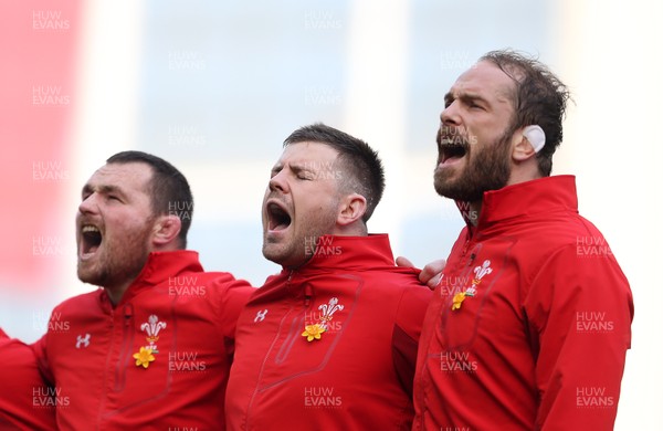 240218 - Ireland v Wales - Natwest 6 Nations - Ken Owens, Rob Evans and Alun Wyn Jones of Wales sing the anthem