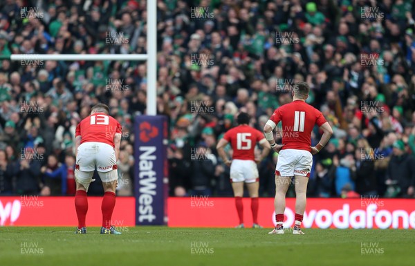 240218 - Ireland v Wales - Natwest 6 Nations - Dejected Scott Williams and Steff Evans of Wales