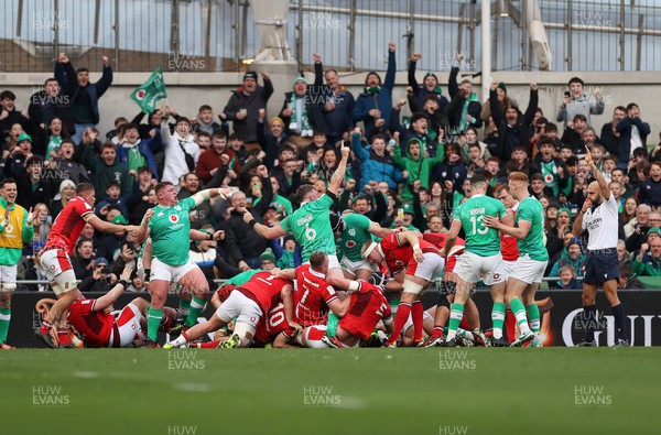 240224 - Ireland v Wales - Guinness 6 Nations Championship - Dan Sheehan of Ireland is pushed over to score a try