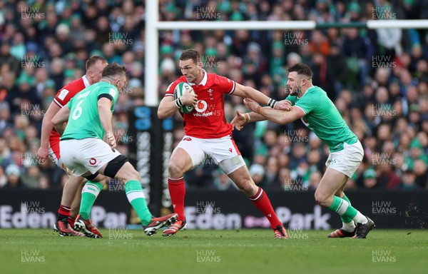 240224 - Ireland v Wales - Guinness 6 Nations Championship - George North of Wales is tackled by Robbie Henshaw of Ireland 