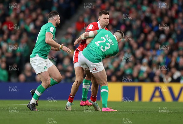 240224 - Ireland v Wales - Guinness 6 Nations Championship - Mason Grady of Wales is tackled by Stuart McCloskey of Ireland 