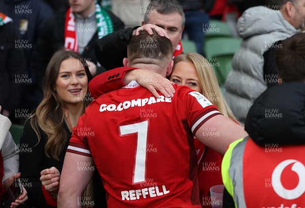 240224 - Ireland v Wales - Guinness 6 Nations Championship - Tommy Reffell of Wales with family at full time
