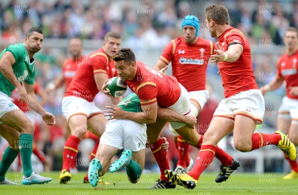 290815 - Ireland v Wales - Guinness Summer Series -Rhys Webb of Wales is tackled by Dave Kearney of Ireland