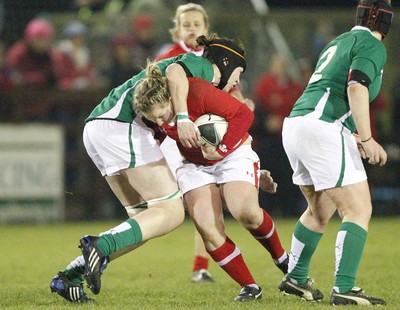 03.02.12 - Ireland Women v Wales Women - Women's Six Nations.Rhian Bowden of Wales is tackled by Marie Louise Reilly of Ireland.