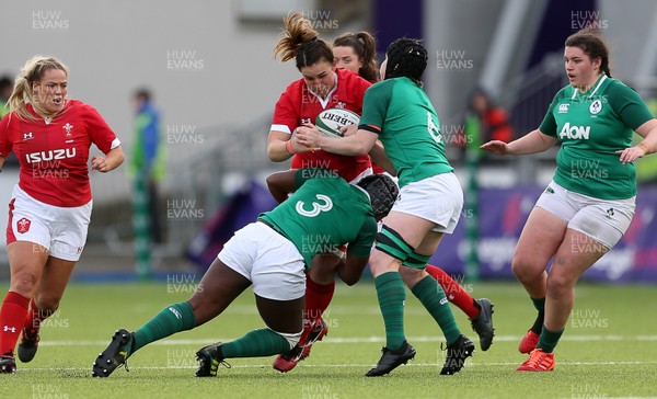 090220 - Ireland Women v Wales Women - Women's 6 Nations Championship - Siwan Lillicrap of Wales is tackled by Linda Djougang and Ciara Griffin of Ireland