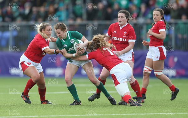 090220 - Ireland Women v Wales Women - Women's 6 Nations Championship - Claire Keohane of Ireland is tackled by Kelsey Jones and Manon Johnes of Wales