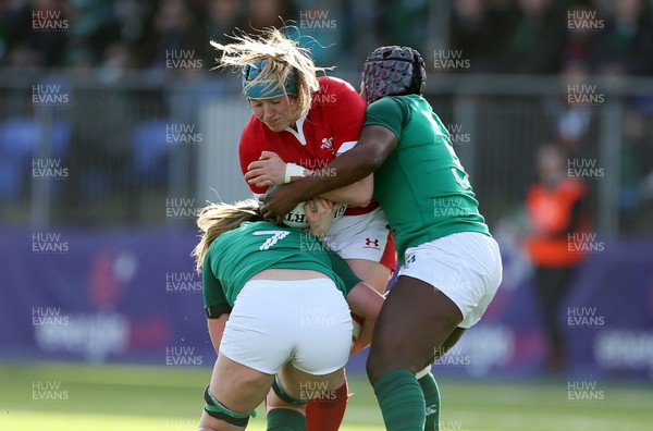 090220 - Ireland Women v Wales Women - Women's 6 Nations Championship - Gwen Crabb of Wales is tackled by Edel McMahon and Linda Djougang of Ireland