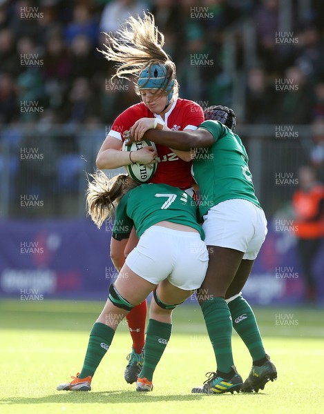 090220 - Ireland Women v Wales Women - Women's 6 Nations Championship - Gwen Crabb of Wales is tackled by Edel McMahon and Linda Djougang of Ireland