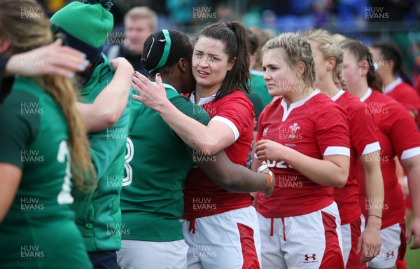 090220 - Ireland Women v Wales Women - Women's 6 Nations Championship - Robyn Wilkins of Wales hugs Linda Djougang of Ireland after the game