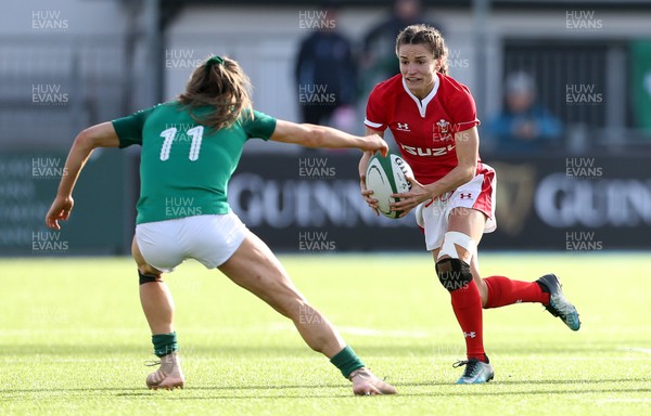 090220 - Ireland Women v Wales Women - Women's 6 Nations Championship - Jazz Joyce of Wales is challenged by Beibhinn Parsons of Ireland