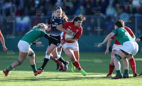 250218 - Ireland Women v Wales Women - Natwest 6 Nations - Rebecca De Filippo of Wales is tackled by Ciara Griffin of Ireland