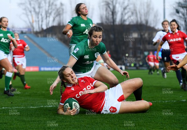 260322 - Ireland Women v Wales Women - TikTok Women’s Six Nations - Hannah Jones of Wales is mobbed by team mates after scoring try