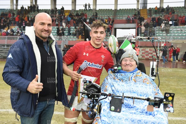 100219 - Italy v Wales - Guinness U20 Six Nations -  Man of the Match Taine Basham with Italian player Denis Dallan