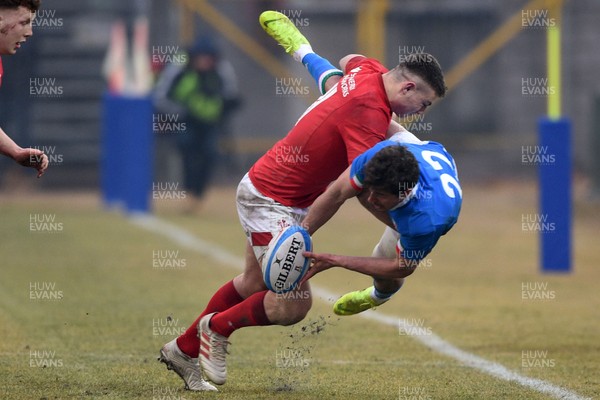 100219 - Italy v Wales - Guinness U20 Six Nations -  Deon Smith tackles Giacomo Da Re 