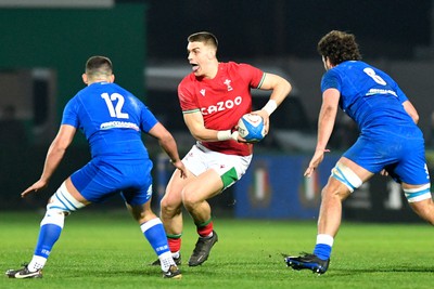 100323 - Italy U20 v Wales U20 - Under 20 Six Nations - Bryn Bradley of Wales takes on Nicola Bozzo of Italy 